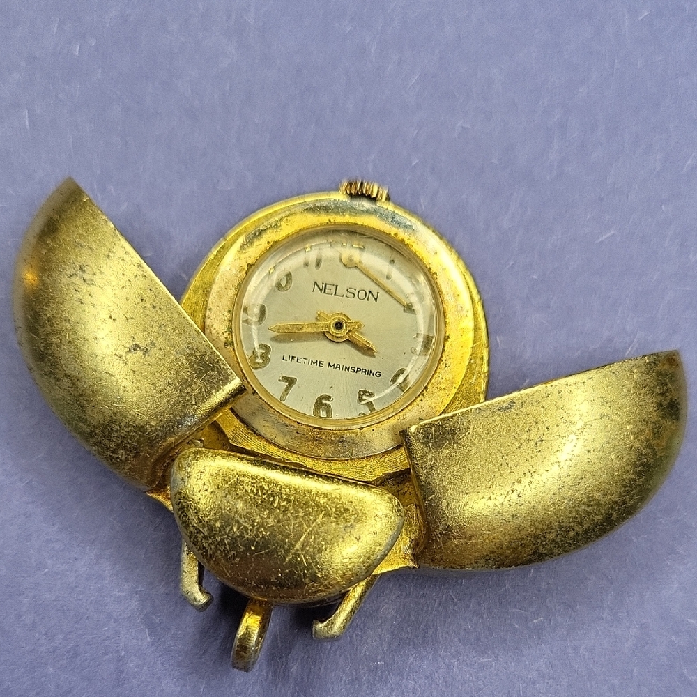 Gold Nelson Watch with Unique Design